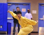 男子拳術組1485號選手Kevin Yang表演長拳門﹐小花拳。(攝影﹕戴兵/大紀元)