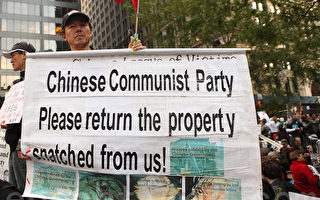 占领华尔街现华人 期待占领北京