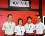 在2011年新唐人武術大賽中獲優秀獎的渥太華明洪堂弟子：Luc Charlebois，方錦芳，Kevin Chan, Jason Webber（左起）。（攝影:  / 大紀元）