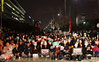 韩国会强行通过FTA 反对党投催泪弹