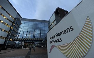 2011年11月23日，诺基亚西门子通信公司（Nokia Siemens Networks）宣布计划到2013年底裁员约17,000人左右。图为位于芬兰埃斯波（Espoo）的诺基亚西门子通信公司 （AFP PHOTO/LEHTIKUVA/Vesa Moilanen）