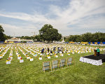 2012年7月12日，美国首都华盛顿美国国会前，法轮功学员举行集会，呼吁解体中共、停止迫害法轮功、声援1.2亿三退。（摄影：爱德华／大纪元）