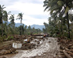颱風「寶發」（Bopha）襲菲律賓，傷亡人數持續上升，已至少200人死亡，逾21萬人受災。（AFP）