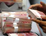 大陸資金隱患正在威脅大陸部份中小房企的生存，為了求得更多的融資路徑，不惜「賤賣」去香港上市，補充資金「血液」。 (AFP)