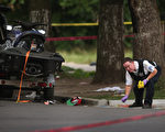 自上周三以来，芝加哥发生了多起枪击案，造成12名男性死亡，至少60人受伤。图为7月6日芝加哥警方在调查犯罪现场。（Scott Olson/Getty Images）