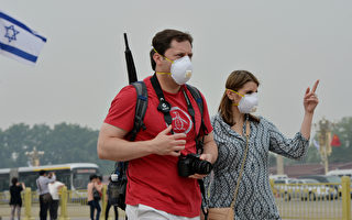 美联社：被恶劣空气吓退 游客访华大幅减少