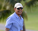正在夏威夷度假的美國總統奧巴馬日前在醫改法案的現場交易點購買了健康保險，但他事實上不會使用。這一舉動更具象征意義，表示他對新健保法的支持。(圖源：JEWEL SAMAD/AFP/Getty Images)