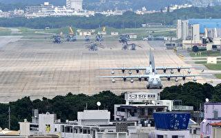 延宕17年的美军驻冲绳普天间基地搬迁计划，27日终获冲绳县同意填海造地申请。(TOSHIFUMI KITAMURA/AFP)