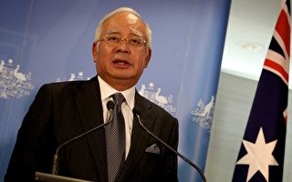 马来西亚总理：目前不宣告马航乘客死亡