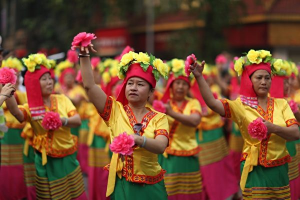 傣族是雲南少數民族之一，在歡慶傣族新年。（圖/Getty Images）