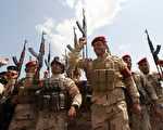 伊拉克什葉派13日呼籲民眾捍衛自己國家。（AFP）