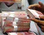 人民幣在台灣漸漸流通，不過台聯黨團總召賴振昌批評，中央銀行未先建立有效人民幣回流機制，就與中國人民銀行簽署「兩岸貨幣清算合作備忘錄」，將造成國安問題。(AFP)