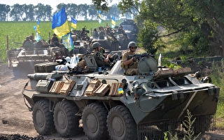 乌克兰冲突加剧：政府军围攻亲俄武装重镇