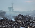 组图：马航MH17失事现场一片狼藉（慎入）