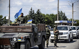 乌克兰暂停火 国际组织进马航失事地点