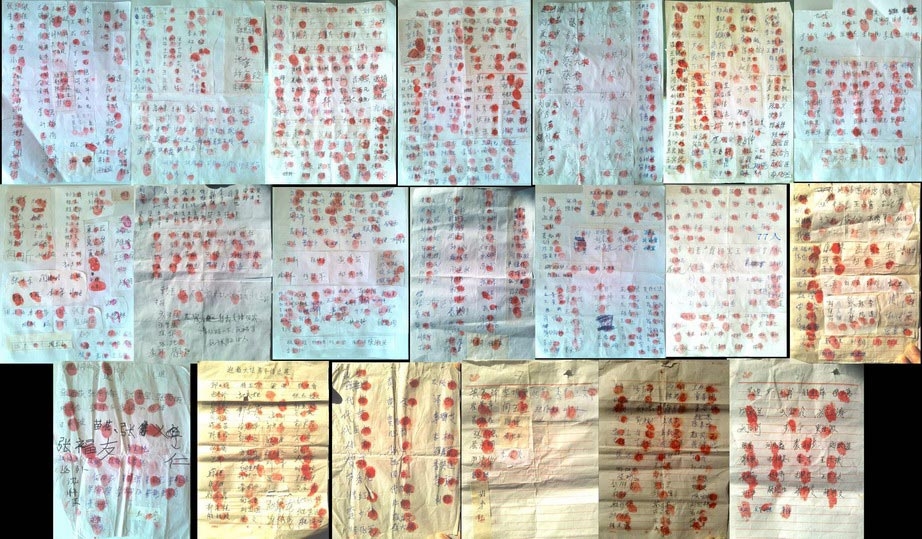 河北民眾為營救法輪功學員信廷超,簽署聯名信、按上紅手印。(明慧網)