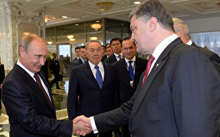 波罗申科和普京结束一对一会谈