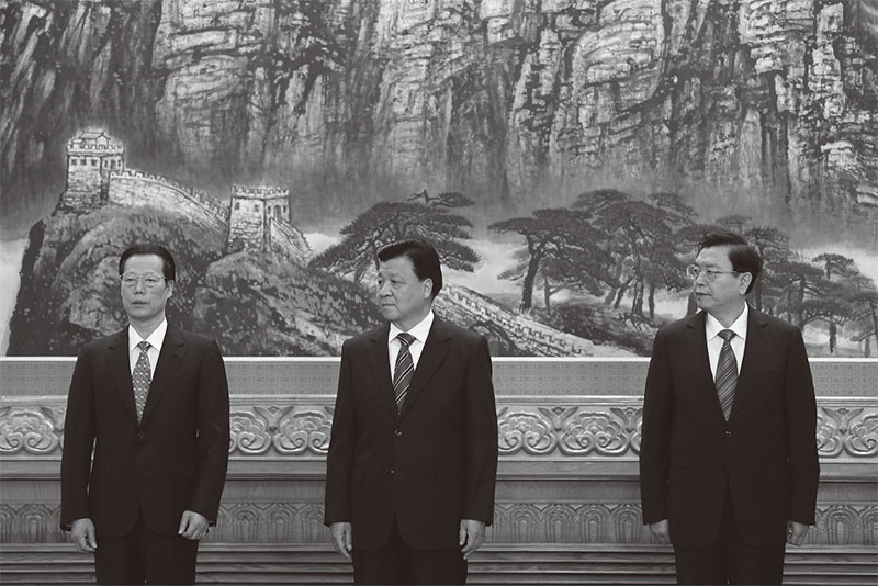 3江派常委:刘云山(中)、张德江(右)和张高丽(左)。(AFP)