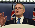 澳洲移民部長莫里森表示，已對受埃博拉疫情影響的西非國家發布旅遊禁令。圖為7月25日，莫里森在悉尼的新聞發布會。（WILLIAM WEST / AFP）