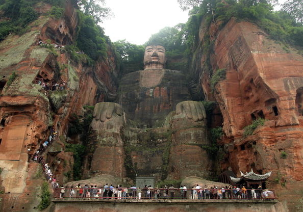 乐山大佛又名凌云大佛,为弥勒坐像,始凿于唐玄宗开元元年(公元713年),历时九十余年完工。(Photo credit should read LIU JIN/AFP/Getty Images) 乐山大佛又名凌云大佛,为弥勒坐像,始凿于唐玄宗开元元年(公元713年),历时九十余年完工。(Photo credit should read LIU JIN/AFP/Getty Images)