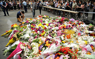 鲜花如潮  悉尼降半旗向人质案死者致哀