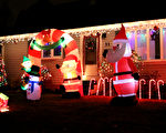 圣诞节灯饰大比拼 谁家庭院更绚丽？
