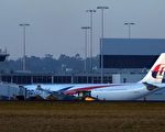 6月12日,馬來西亞航空MH148班機,飛後因引擎異常緊急折返迫降墨爾本機場。(AFP)