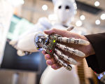 一份最新的報告稱，人工智慧（Artificial Intelligence, AI）將於未來五年取代超過6%的工作。 (CARSTEN KOALL/AFP)