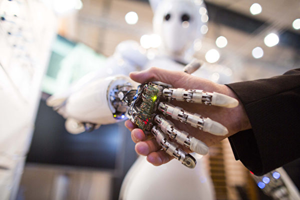 一份最新的報告稱，人工智慧（Artificial Intelligence, AI）將於未來五年取代超過6%的工作。 (CARSTEN KOALL/AFP)