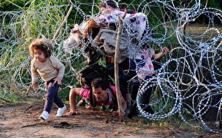 匈牙利宣紧急状态 难民面临铁丝网和坐牢