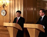 2015年10月21日，習近平與英國首相卡梅倫舉行了聯合記者會。(SUZANNE PLUNKETT/AFP)
