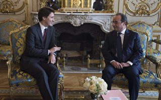 11月29日，加總理特魯多在愛麗捨宮會見法總統奧朗德，雙方就反恐戰略和氣候峰會交換了意見。（加通社）