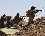 12月8日，伊拉克政府军表示，已经从伊斯兰国手中夺回战略重镇拉马迪大部分城区。(AHMAD AL-RUBAYE/AFP/Getty Images)