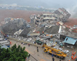 2015年12月20日上午，广东深圳市光明新区红坳村柳溪工业园在两声爆炸后发生山体滑坡，将整个10万多平方米的工业园吞掉。最初报，现场有22栋楼房被埋，涉及15家公司，伤亡尚无法估计。(AFP)