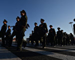 大陆官媒日前报导，习近平军改中“军委管总”的四总部撤并，职能部门变更为15个。(MARK RALSTON/AFP/Getty Images)
