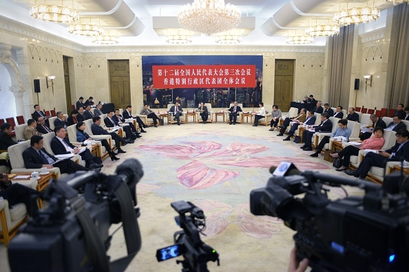 2015年中共两会香港人大代表团会议现场。(WANG ZHAO/AFP/Getty Images) 2015年中共两会香港人大代表团会议现场。(WANG ZHAO/AFP/Getty Images)
