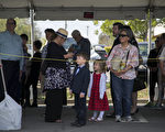 SIMI VALLEY, CA - MARCH 9:  People wait to board shuttle buses for the public viewing for former first lady Nancy Reagan at the Ronald Reagan Presidential Library on March 9, 2016  in Simi Valley, California. The first lady lies in repose and will be buried next to her husband at the library.  (Photo by David McNew/Getty Images)
