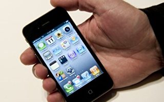 美国司法部4月8日表示，要求苹果给一个涉嫌贩毒的华裔的iPhone手机解锁。(AFP PHOTO/DON EMMERT)