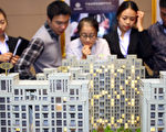 2016年以來，上海房價一漲再漲，但隨著新政策的出台，恐怕又一波人將會陷入退房的困境。(AFP/AFP/Getty Images)