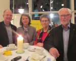 4月12日晚，丹麦一所大学预科学校的校长Ole Malgaard（左一）和太太（左二）和咨询公司老板Hans Willumsen（右一）和太太（右二）一起在奥胡斯观看了神韵演出。（麦蕾／大纪元）