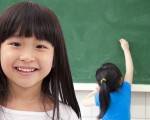 happy asian student girls at school classroom