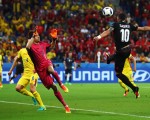LYON, FRANCE - JUNE 19:  Armando Sadiku (R) of Albania heads the ball to score the opening goal past Ciprian Tatarusanu (C) of Romania during the UEFA EURO 2016 Group A match between Romania and Albania at Stade des Lumieres on June 19, 2016 in Lyon, France.  (Photo by Michael Steele/Getty Images)