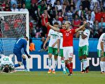 Wales' midfielder Aaron Ramsey celebrates their victory during the Euro 2016 round of sixteen football match Wales vs Northern Ireland, on June 25, 2016 at the Parc des Princes stadium in Paris. / AFP / Thomas SAMSON        (Photo credit should read THOMAS SAMSON/AFP/Getty Images)