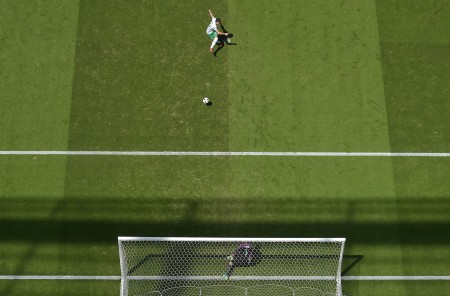 Ireland's midfielder Robert Brady (top) scores against France's goalkeeper Hugo Lloris during the Euro 2016 round of 16 football match between France and Republic of Ireland at the Parc Olympique Lyonnais stadium in Décines-Charpieu, near Lyon, on June 26, 2016. / AFP / Valery HACHE (Photo credit should read VALERY HACHE/AFP/Getty Images)