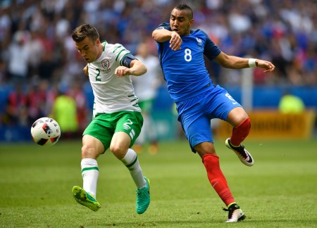Ireland's defender Seamus Coleman (L) vies for the ball with France's forward Dimitri Payet during the Euro 2016 round of 16 football match between France and Republic of Ireland at the Parc Olympique Lyonnais stadium in Decines-Charpieu, near Lyon, on June 26, 2016. / AFP / MARTIN BUREAU (Photo credit should read MARTIN BUREAU/AFP/Getty Images)
