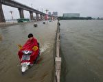 中国大陆暴发洪水灾情，官方统计26省受灾，农损面积2,942千公顷，受灾人口3,282万人，186人死亡、45人失踪。（AFP）