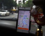 北京宣布“网约车”合法 Uber滴滴获认可