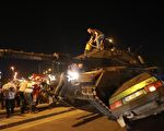 A tank crashes a car as people take streets in Ankara, Turkey during a protest agaist military coup on July 16, 2016.
42 dead in Ankara coup attempt clashes: TV citing prosecutor. Turkish military forces on July 16 opened fire on crowds gathered in Istanbul following a coup attempt, causing casualties, an AFP photographer said. The soldiers opened fire on grounds around the first bridge across the Bosphorus dividing Europe and Asia, said the photographer, who saw wounded people being taken to ambulances.
 / AFP / ADEM ALTAN        (Photo credit should read ADEM ALTAN/AFP/Getty Images)
