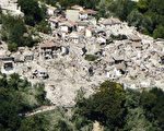 A hand out picture taken by the Guardia di Finanza press office on August 24, 2016 and released on August 25, 2016 shows an aerial view of the vilage of Pescara del Tronto in central Italy after a strong eartquake that claimed at least 247 lives.
Central Italy was struck by a powerful, 6.2-magnitude earthquake in the early hours of August 24, that shook central Italy and the death toll rose to 247 on August 25, as rescuers desperately searched for survivors in the rubble of devastated mountain villages. Hundreds of others were injured, some critically, and an unknown number were trapped under the ruins of collapsed buildings after Wednesday's pre-dawn quake. / AFP PHOTO / Guardia di Finanza press office / HO / RESTRICTED TO EDITORIAL USE - MANDATORY CREDIT "AFP PHOTO / GUARDIA DI FINANZA PRESS OFFICE" - NO MARKETING NO ADVERTISING CAMPAIGNS - DISTRIBUTED AS A SERVICE TO CLIENTS