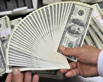 1月3日，美元對歐元上升至14年來最高水平。(JUNG YEON-JE/AFP/Getty Images)